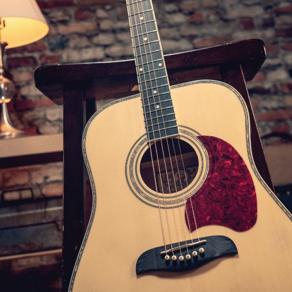 DSC03727 acoustic guitar resting on chair