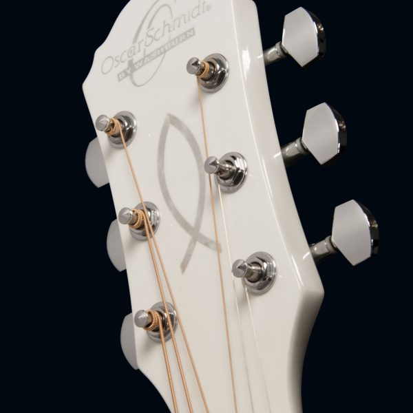 closeup of white headstock on Oscar Schmidt acoustic guitar