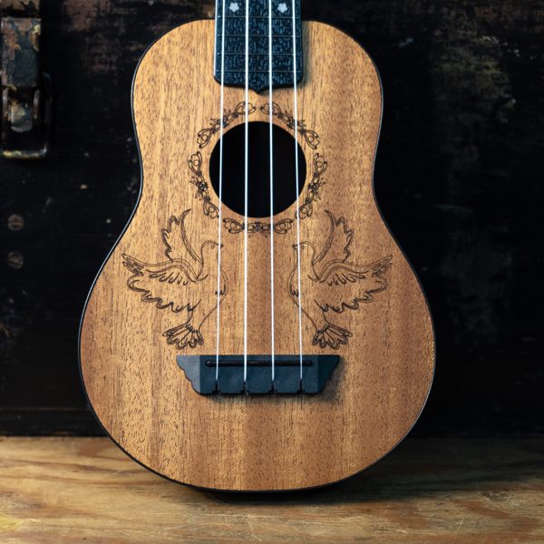 body of Oscar Schmidt ukulele with dove design