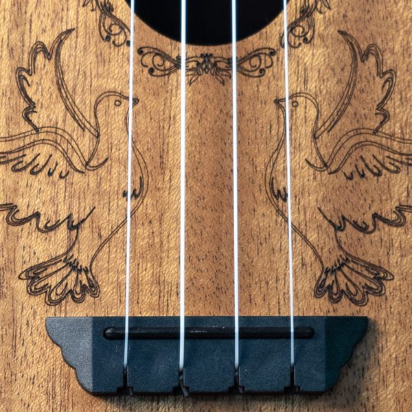 closeup of body of Oscar Schmidt ukulele with dove design