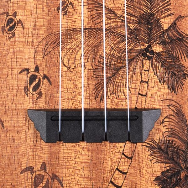 closeup of body of Oscaer Schmidt ukulele with turtle design